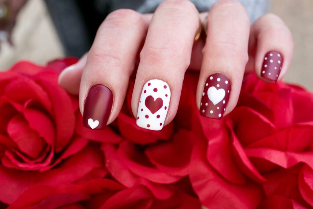 Heart shapes with polka dots nail art designs